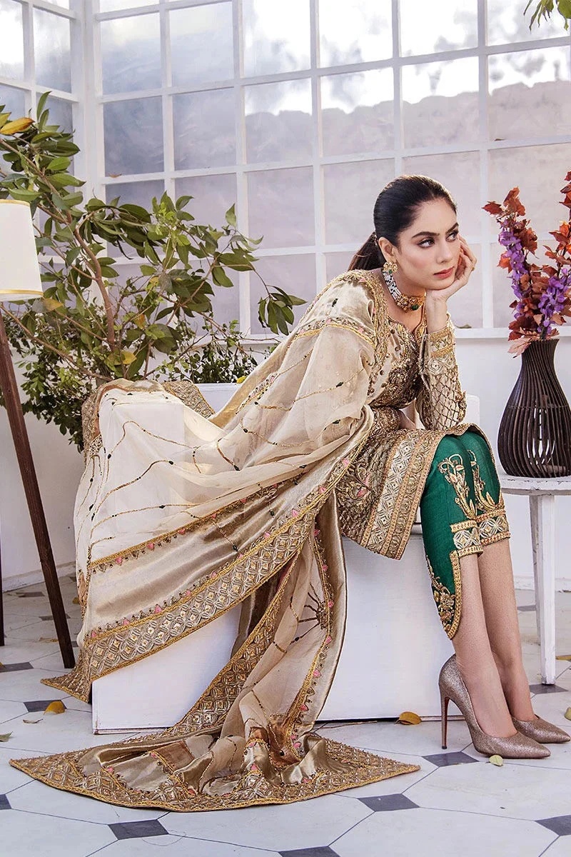 Noor- e- Samar pakistani fashion outfit in gold, green tones.
